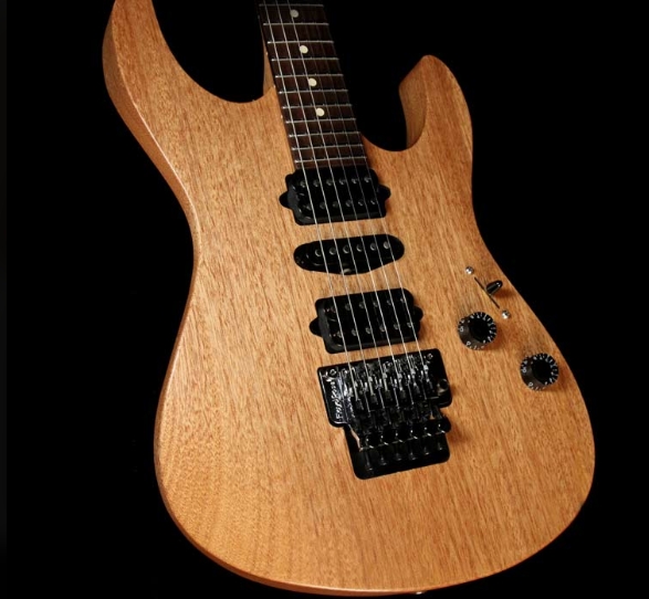 How Does Okoume Wood Density Affect Guitar Weight And Sound?